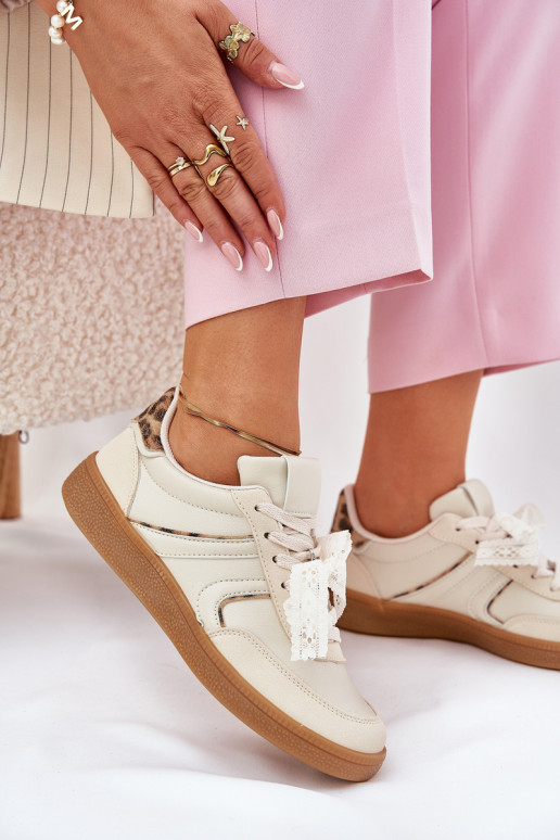 Niedrige Sneaker-Modelle für Damen mit Schnürsenkeln und Leopardenfell-Muster in sandfarbener Zielle Niedrige Sneaker-Modelle für Damen mit Schnürsenkeln und Leopardenfell-Muster in sandfarbener Zielle