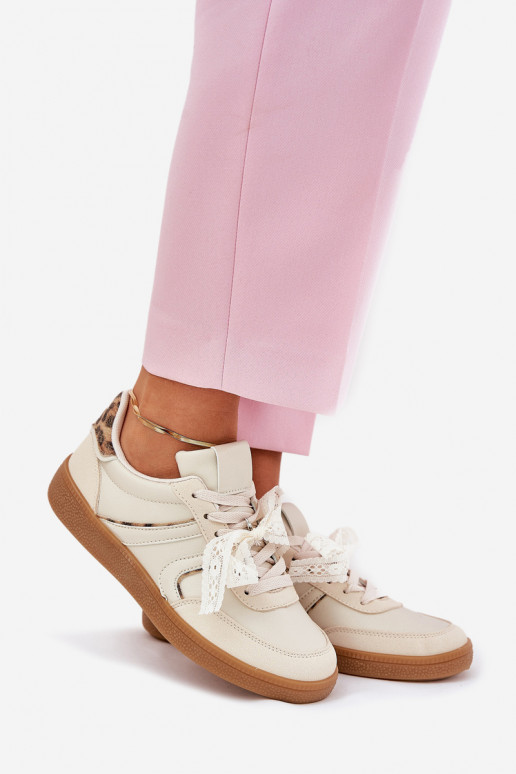Niedrige Sneaker-Modelle für Damen mit Schnürsenkeln und Leopardenfell-Muster in sandfarbener Zielle Niedrige Sneaker-Modelle für Damen mit Schnürsenkeln und Leopardenfell-Muster in sandfarbener Zielle