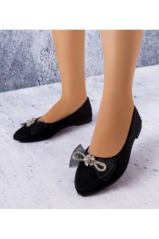 Schwarze Schuhe mit Schleife und...