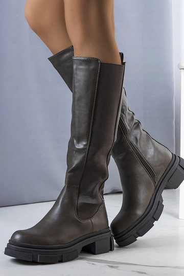 Grüne isolierte Stiefel Flores