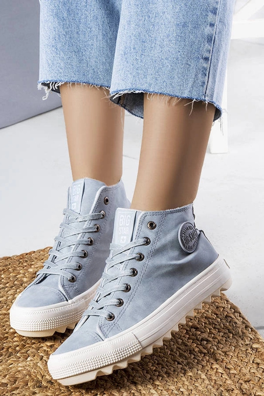 Blaue isolierte Sneakers Big Star...
