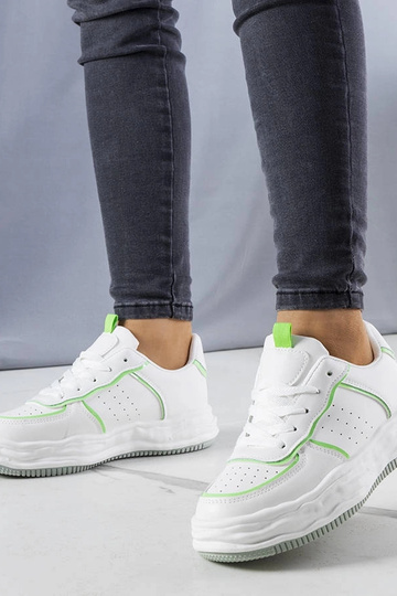 Weiße Sneakers mit grünen...