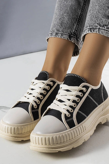 Schwarze Plateau-Sneakers... 2