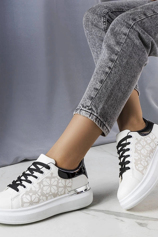 Schwarze und weiße perforierte... Schwarze und weiße perforierte...