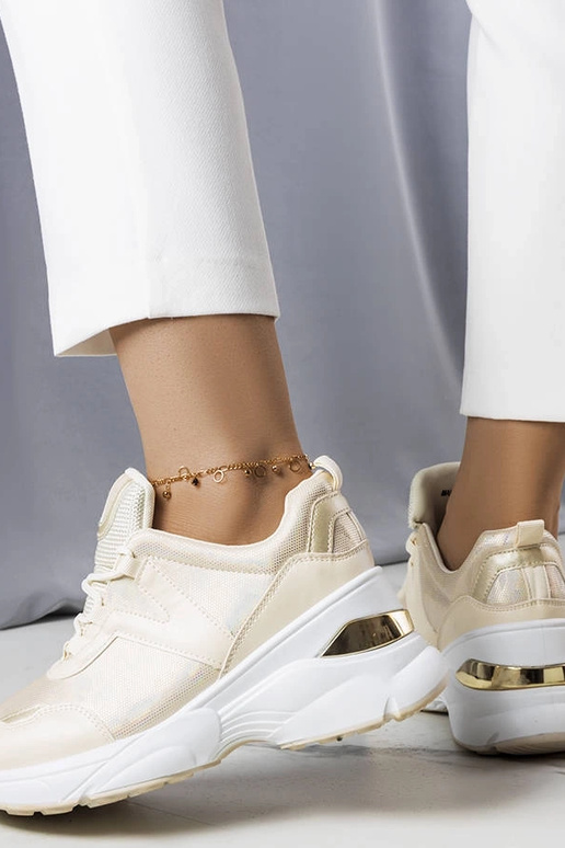 Beige Sneakers mit metallischen... Beige Sneakers mit metallischen...