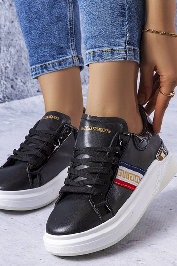 Schwarze Schuhe mit...