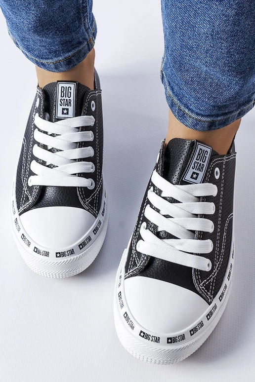 Schwarze durchbrochene Sneakers Big... Schwarze durchbrochene Sneakers Big...