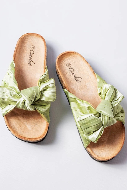 Grüne Flip-Flops mit Schleife von...