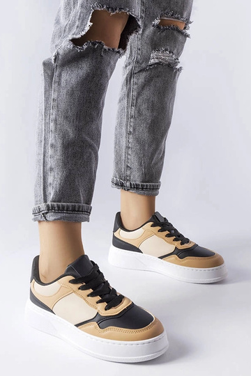 Schwarze und beige Schuhe... 2