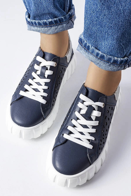 Dunkelblaue Sportschuhe mit...