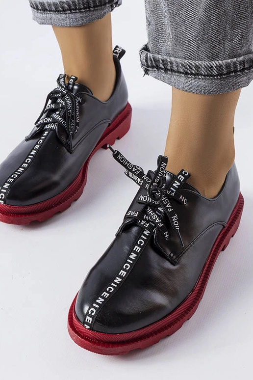 Schwarze Stiefeletten mit... Schwarze Stiefeletten mit...