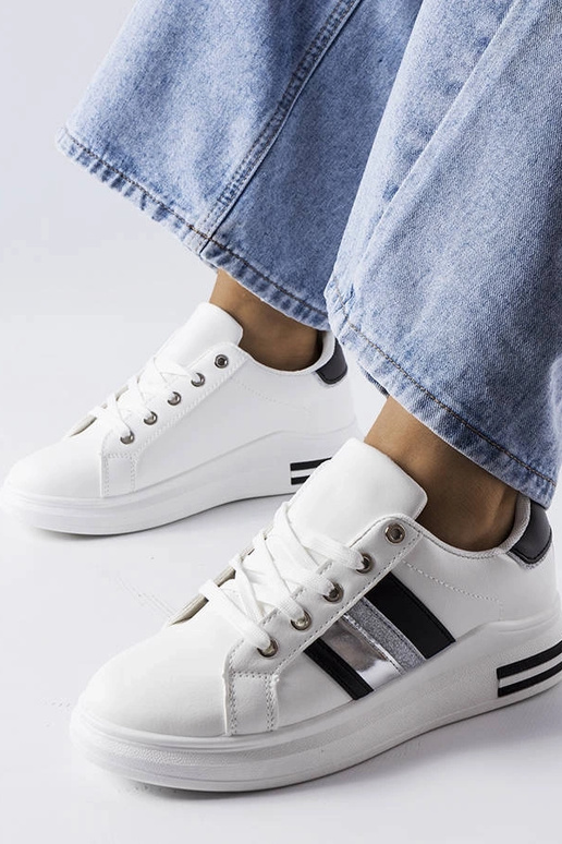 Schwarz-weiße Sportschuhe auf...