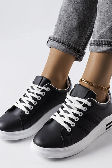 Schwarze Plateau-Sneakers... 2