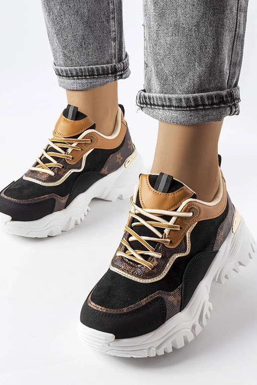 Schwarze Sneakers mit unregelmäßiger... Schwarze Sneakers mit unregelmäßiger...