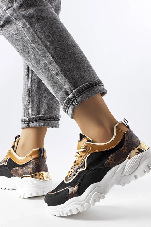 Schwarze Sneakers mit unregelmäßiger... Schwarze Sneakers mit unregelmäßiger...