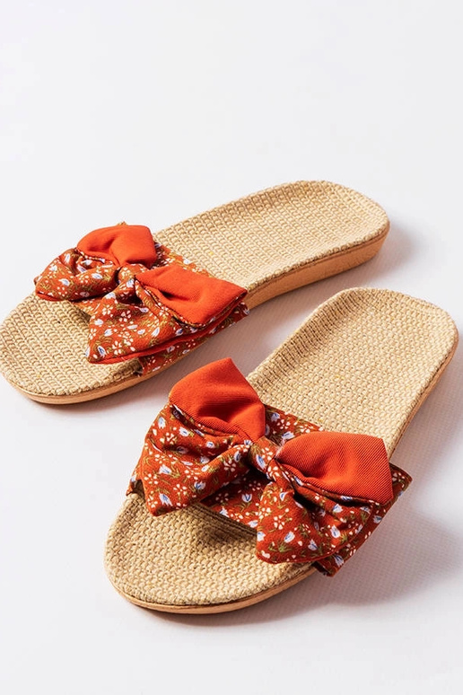 Rote Flip-Flops mit Schleife Tachel