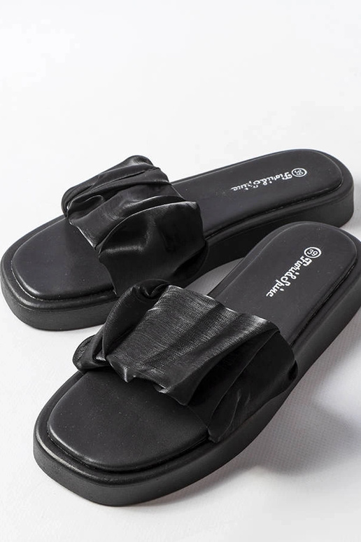 Schwarze Flip-Flops mit Rüschen... Schwarze Flip-Flops mit Rüschen...