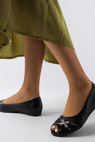 Durchbrochene schwarze Ballerinas mit Simpsville-Schleife