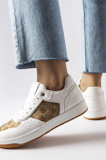 Weiße Sneakers verziert mit Isidoras Monogramm 2