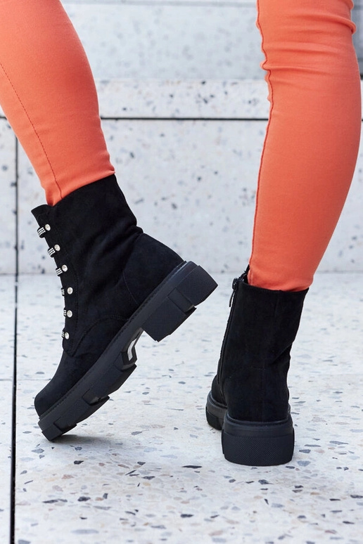 Schwarze Knöchel-Stiefel mit... Schwarze Knöchel-Stiefel mit...