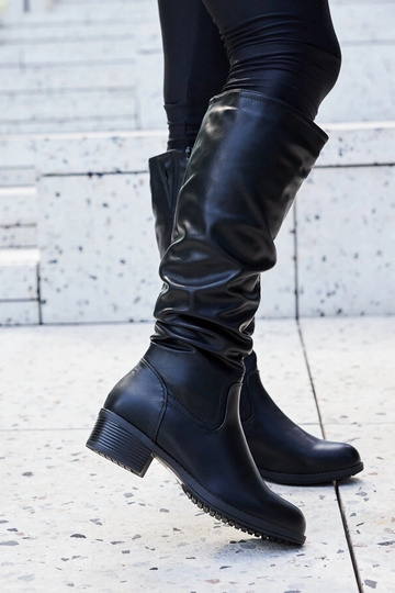 Schwarze Angelico-Stiefel mit Rüschen