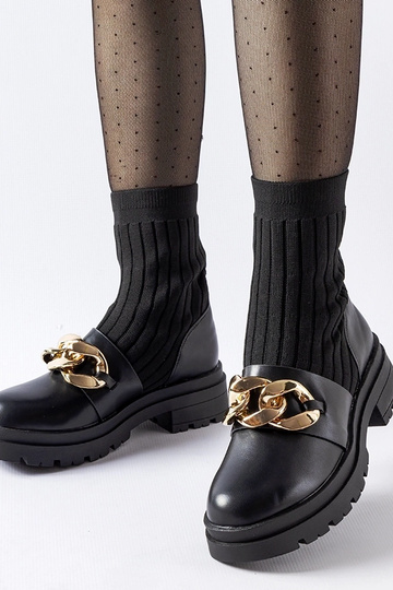 Schwarze Sockenstiefeletten...