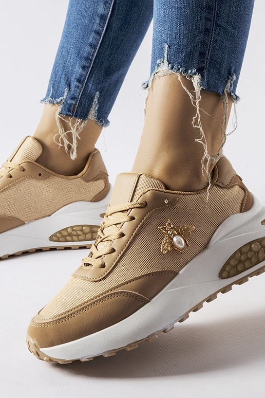 Braune und weiße Sneaker mit...