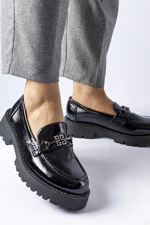 Schwarze lackierte Mokassins mit... Schwarze lackierte Mokassins mit...