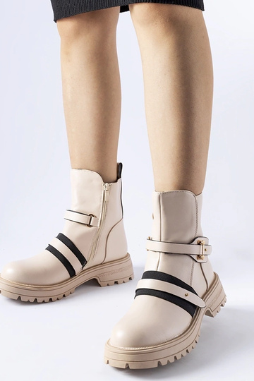 Beige isolierte Stiefel Laderoute