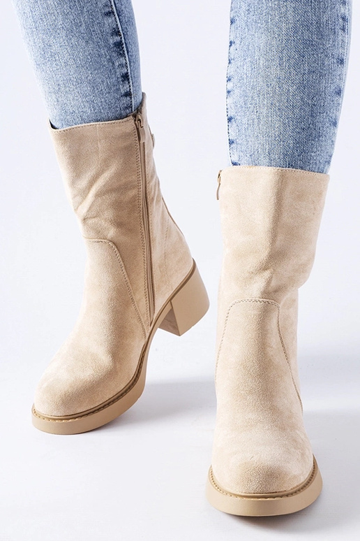 Beige Knöchel-Stiefel mit... Beige Knöchel-Stiefel mit...