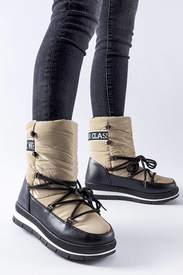 Dunkelbeige Schneestiefel...