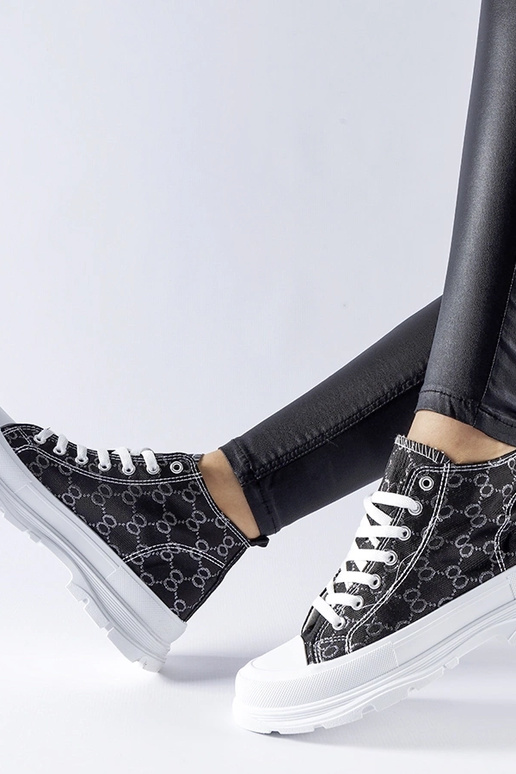 Schwarze Sneaker mit... Schwarze Sneaker mit...