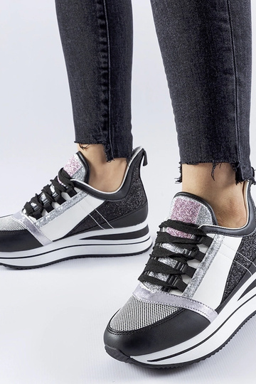 Schwarze Glitzer-Sneaker...