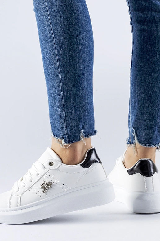 Weiße Sneakers mit... Weiße Sneakers mit...