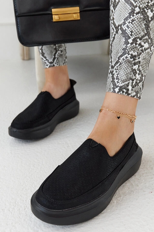 Schwarze durchbrochene Damenschuhe,... Schwarze durchbrochene Damenschuhe,...