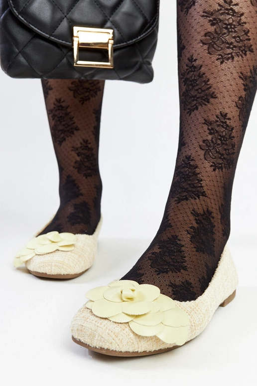 Gelbe Ballerinas mit dekorativer... Gelbe Ballerinas mit dekorativer...