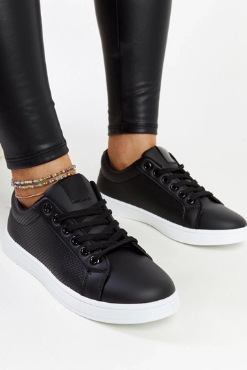 Schwarze Sneakers aus...