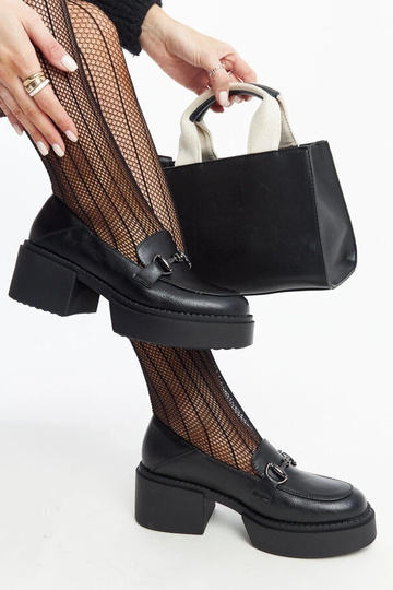 Schwarze Stöckelschuhe aus... 2