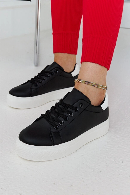 Schwarz-weiße Sneaker mit dicker...