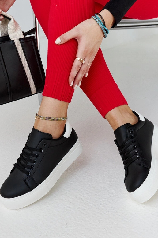 Schwarz-weiße Sneaker mit dicker...