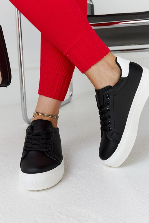 Schwarz-weiße Sneaker mit dicker...