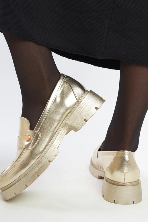 Goldene Mokassins aus Kunstleder...