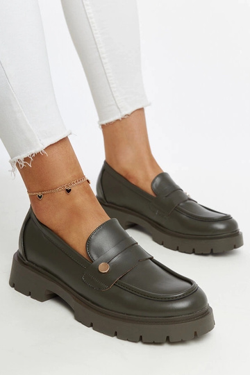 Dunkelgrüne Schuhe aus...