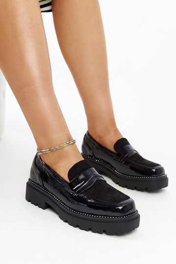 Schwarze Lackschuhe mit...