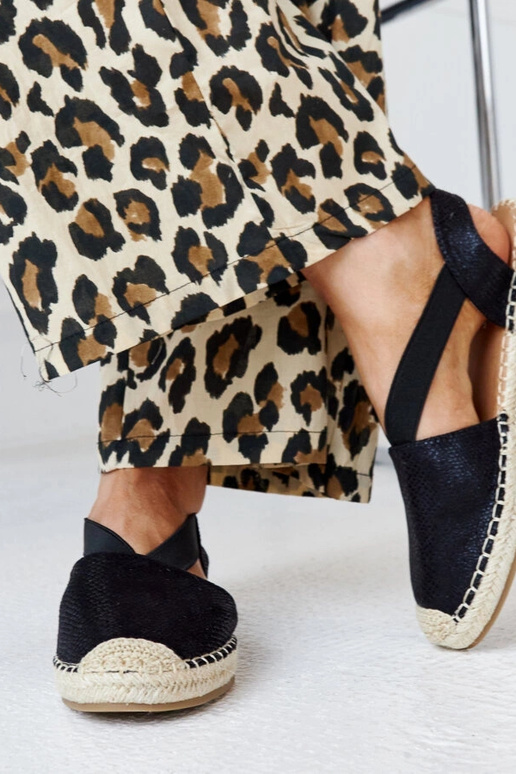 Tharns schwarze Espadrilles mit...