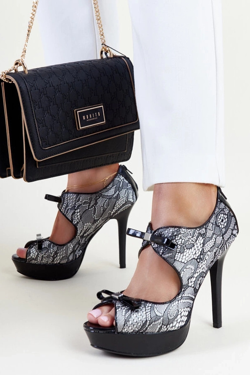 Elegante Metla-Heels in Schwarz und Weiß Elegante Metla-Heels in Schwarz und Weiß