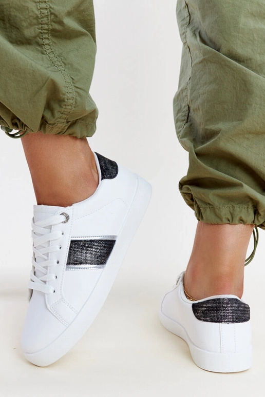 Schwarz-weiße Sneakers mit...