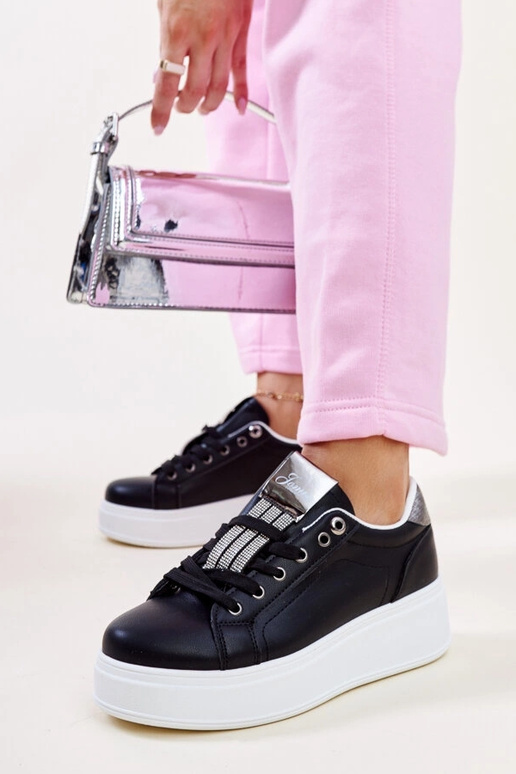 Schwarze und silberne Sneakers mit...