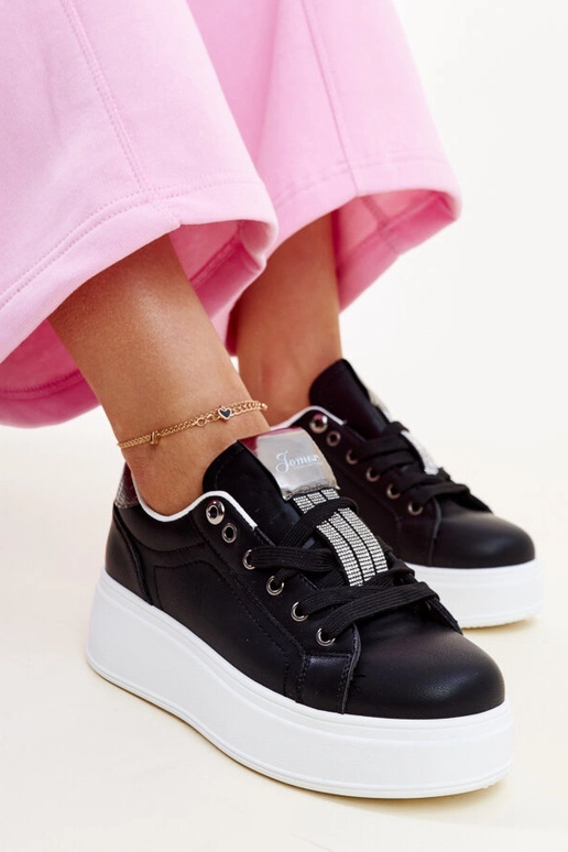 Schwarze und silberne Sneakers mit...