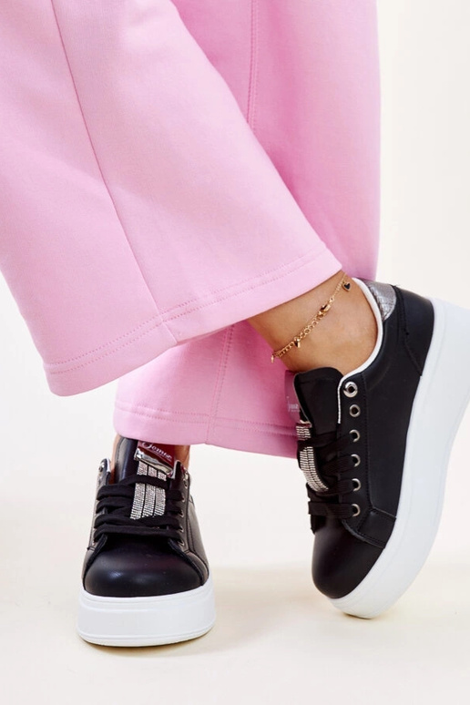 Schwarze und silberne Sneakers mit...